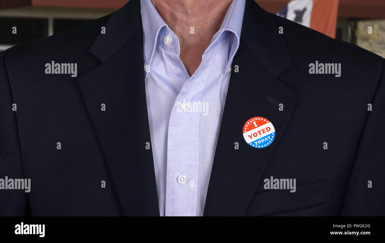 Senior caucasian man in formal clothing with Voted sticker Stock Photo