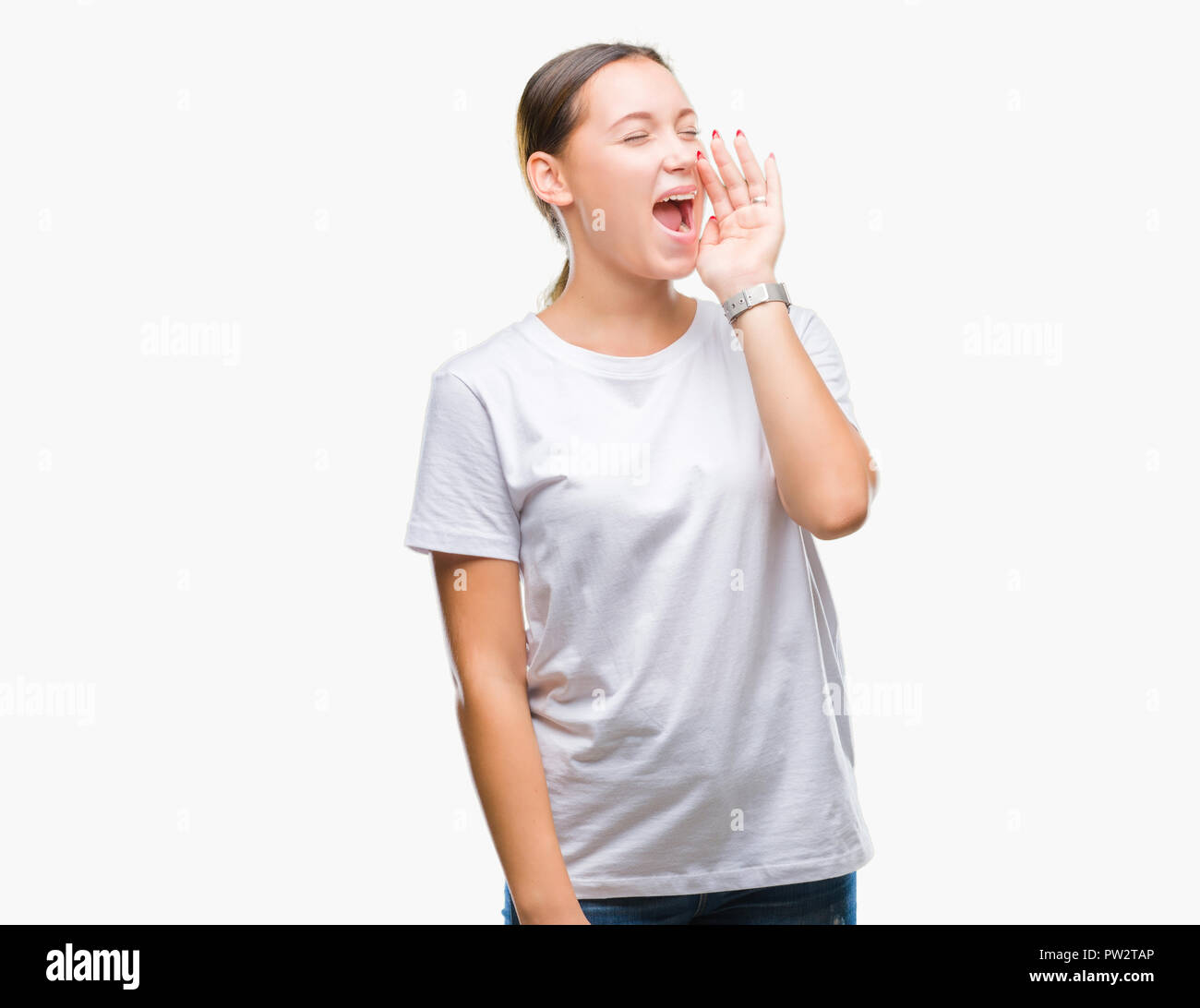 Young beautiful caucasian woman over isolated background shouting and