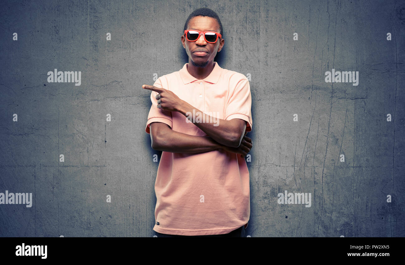 Funny african man pointing hi-res stock photography and images - Alamy