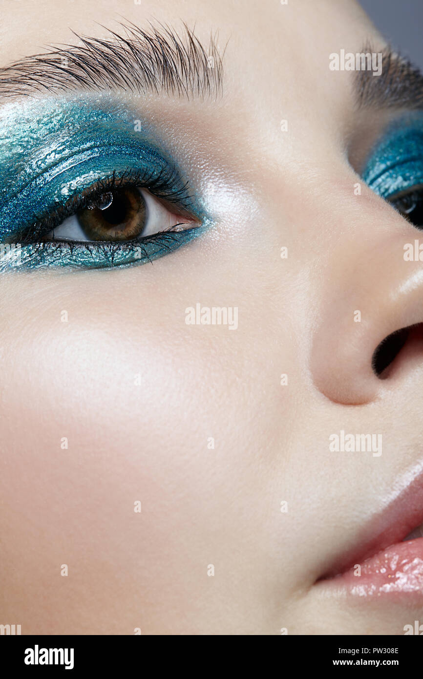 Closeup macro portrait of female face. Woman with evening beauty makeup ...