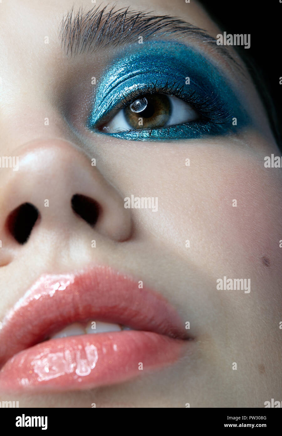 Closeup macro portrait of female face. Woman with evening beauty makeup ...