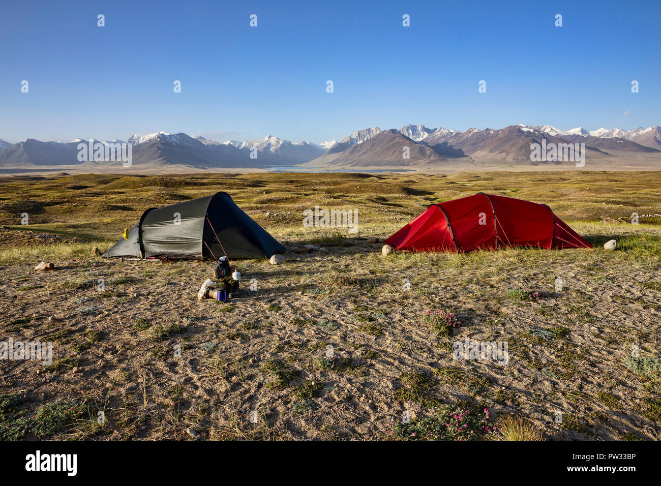 Backcountry campsite, Afghan-Tajik border with Afghan Great Pamir and Concord Mt in background, Zorkul Nature Reserve, Pamir Mountains, Tajikistan Stock Photo