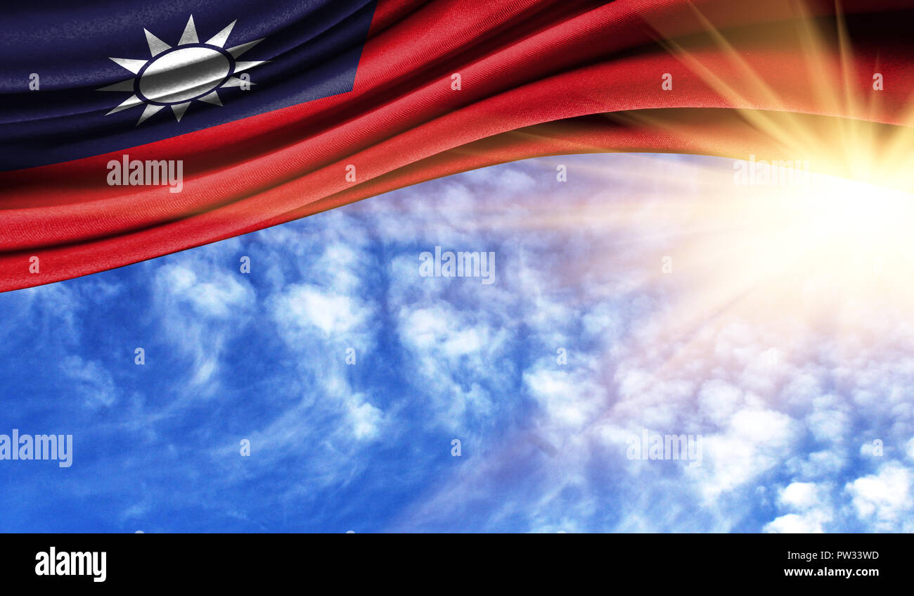 the flag of Taiwan in the rays of the summer sun, in the sky