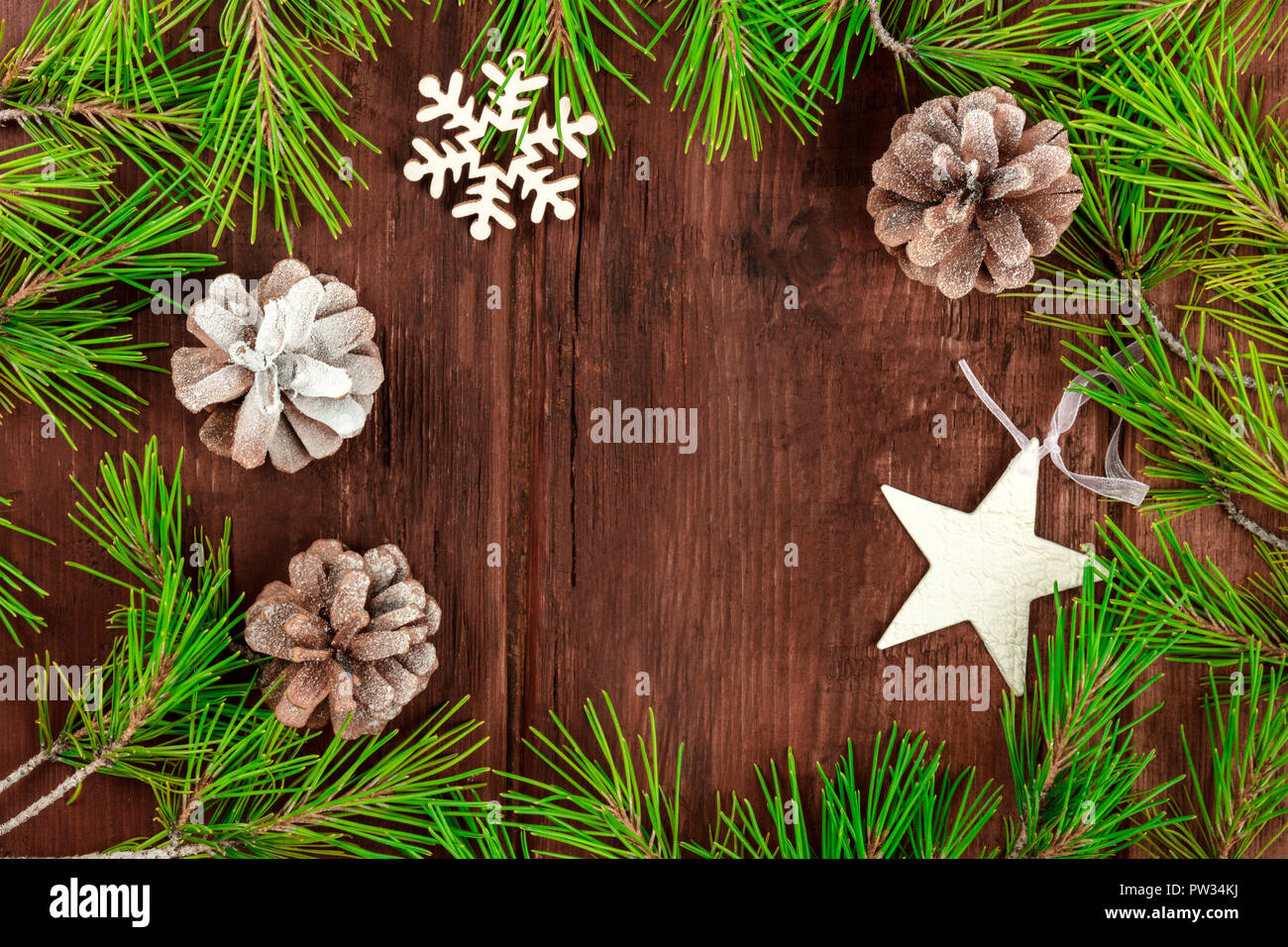 Christmas background with fir tree branches, cones, snow and xmas ...