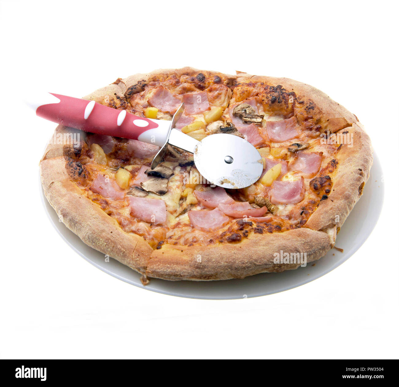 Domino’s Smaller Pizza with a Pizza Cutter Wheel Stock Photo Alamy