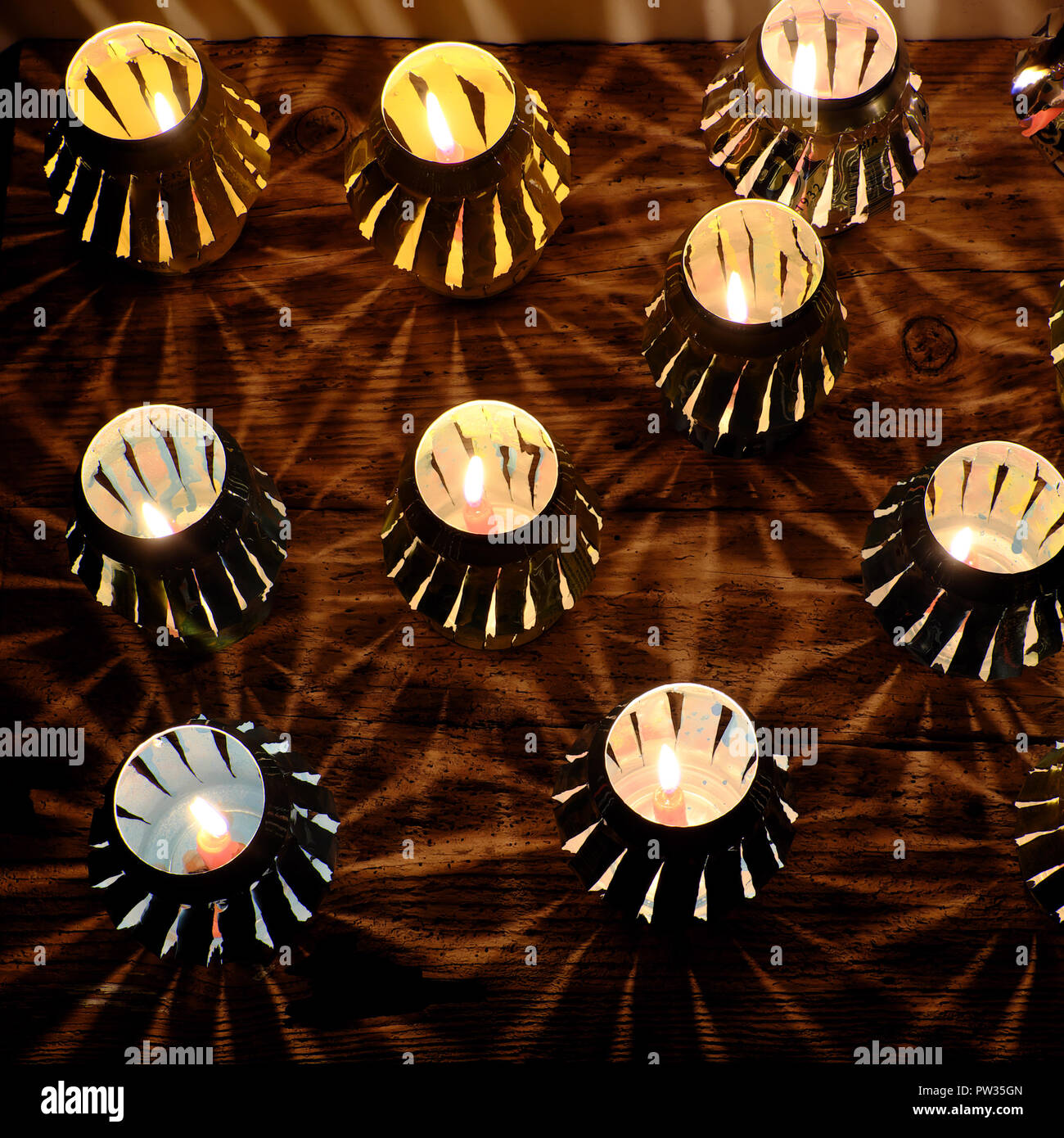 Handmade lantern that recycling from can of beer and fire by candle