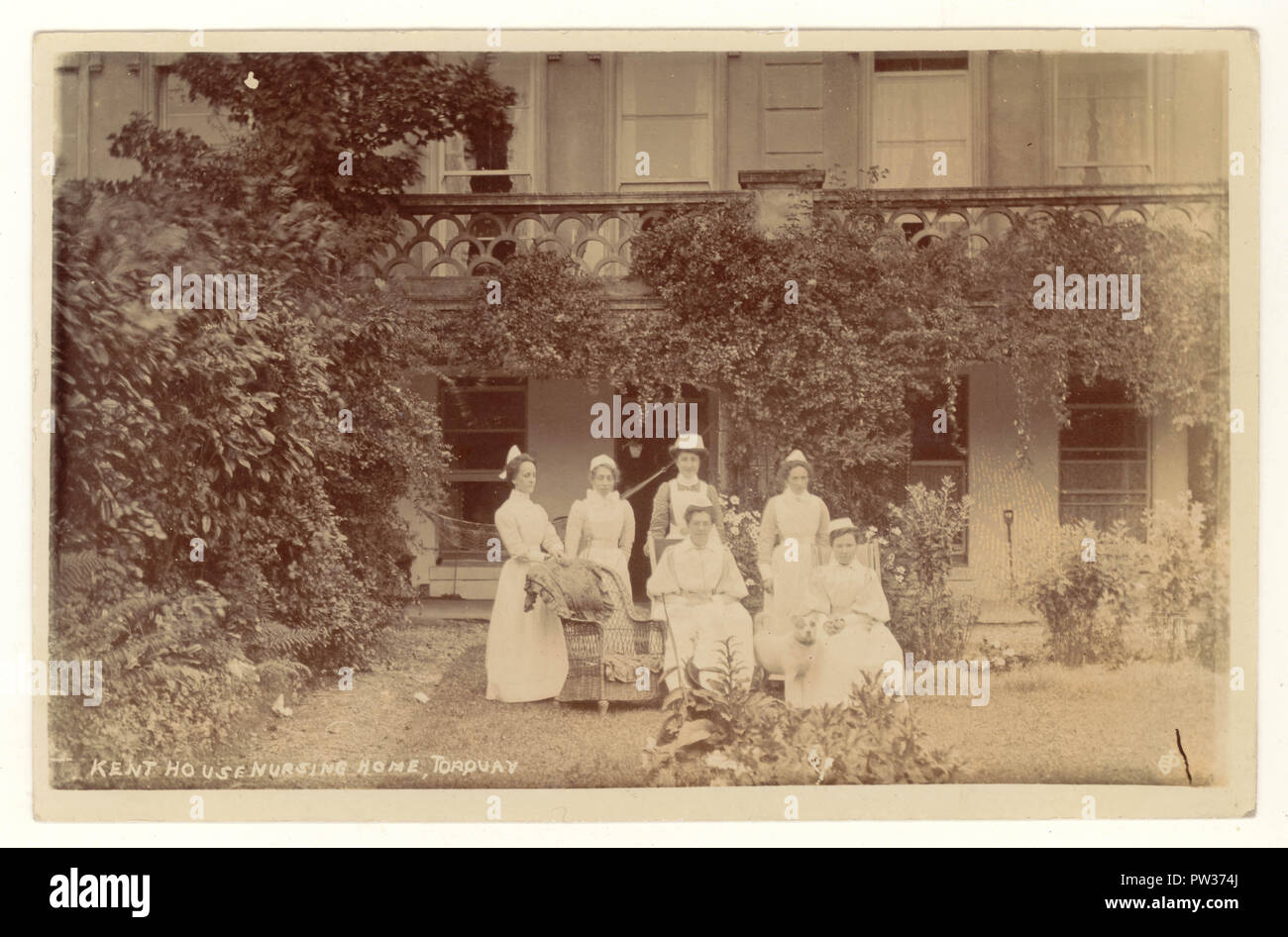 Original Edwardian era postcard portrait of nurse maids at Kent House nursing (care) home, Torquay, Devon, U.K. posted June 1906 Stock Photo
