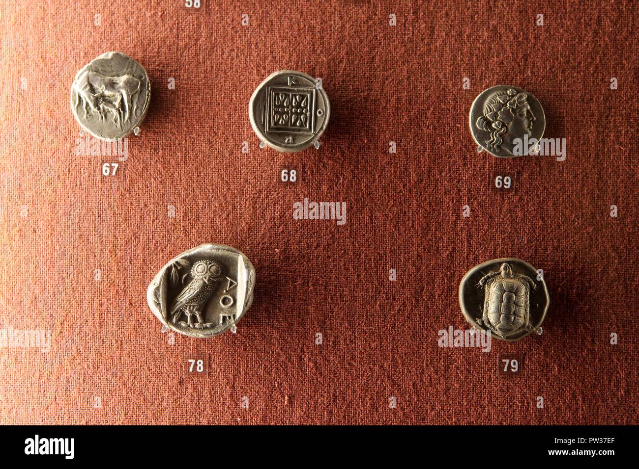 Ancient Greek coins.in Numismatic museum Athens Greece Stock Photo