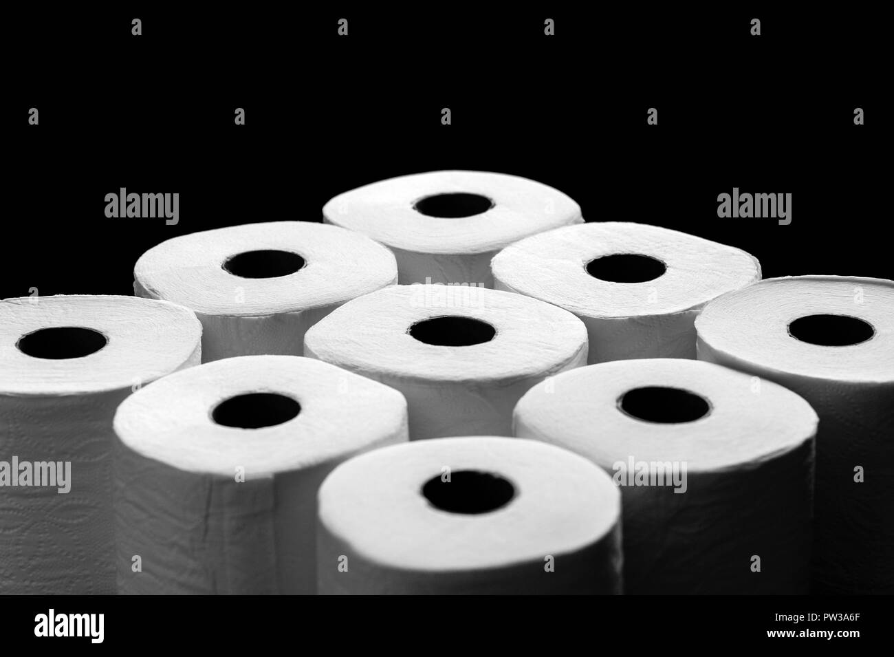 Toilet paper with heavy contrast creating abstract patterns in black