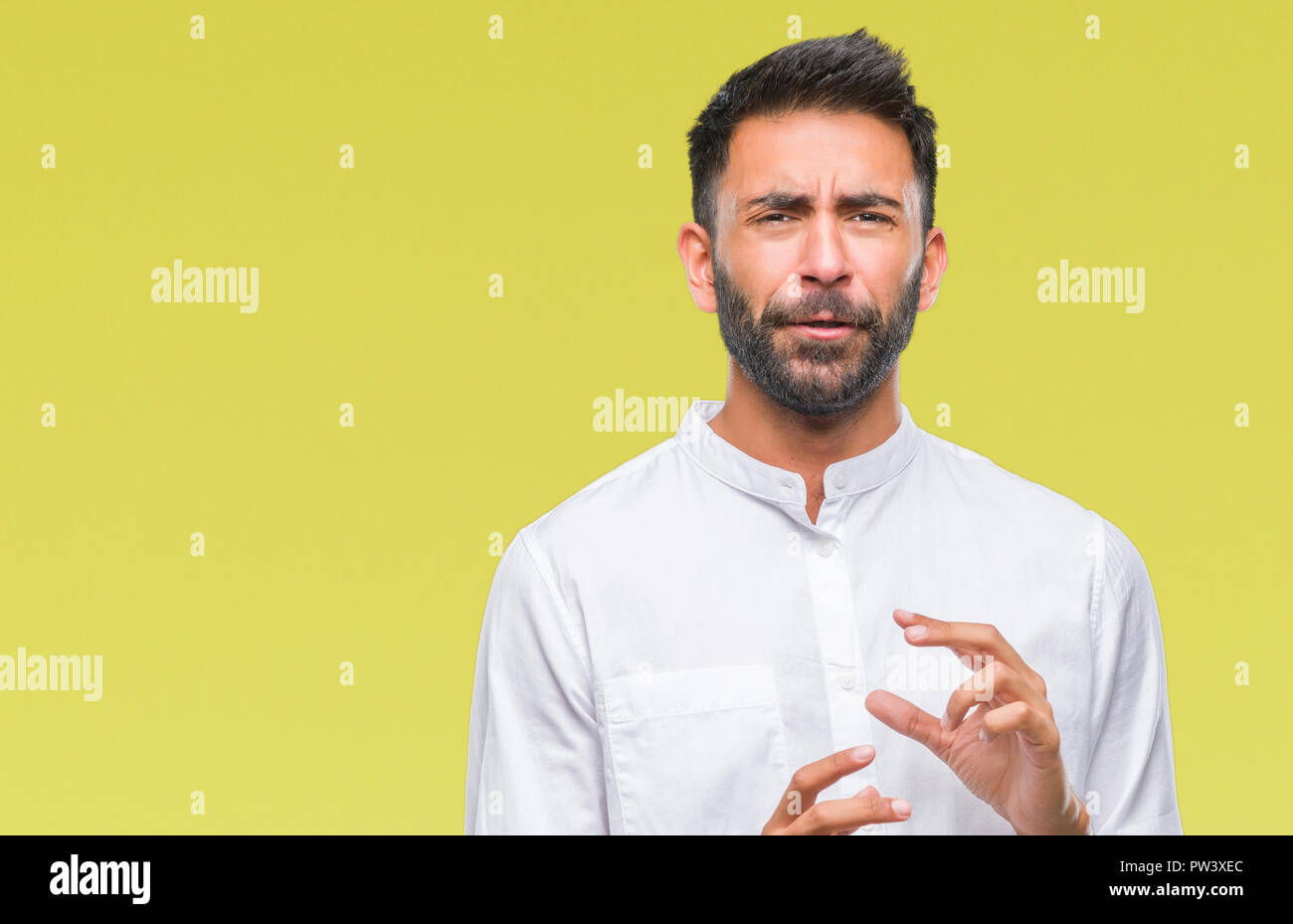 Adult hispanic man over isolated background disgusted expression ...