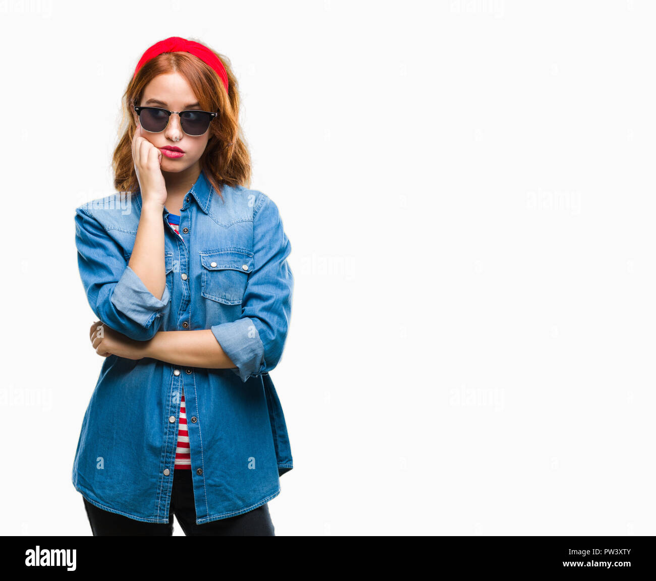 Young beautiful woman over isolated background wearing sunglasses