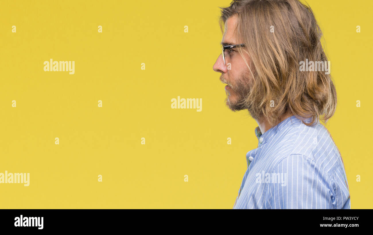 Young Handsome Man With Long Hair Wearing Glasses Over Isolated