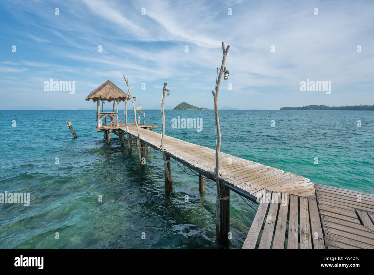 Wooden pier with hut in Phuket, Thailand. Summer, Travel, Vacation and Holiday concept. Stock Photo