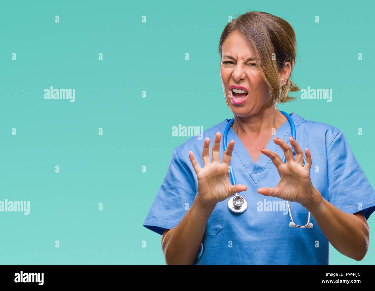 middle-age-senior-nurse-doctor-woman-over-isolated-background-disgusted-expression-displeased-and-fearful-doing-disgust-face-because-aversion-reactio-PW44JG.jpg
