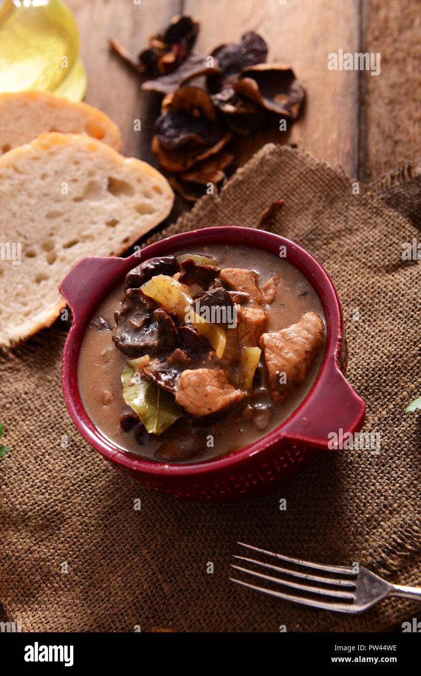 Stew with meat, mushrooms and vegetables Stock Photo - Alamy