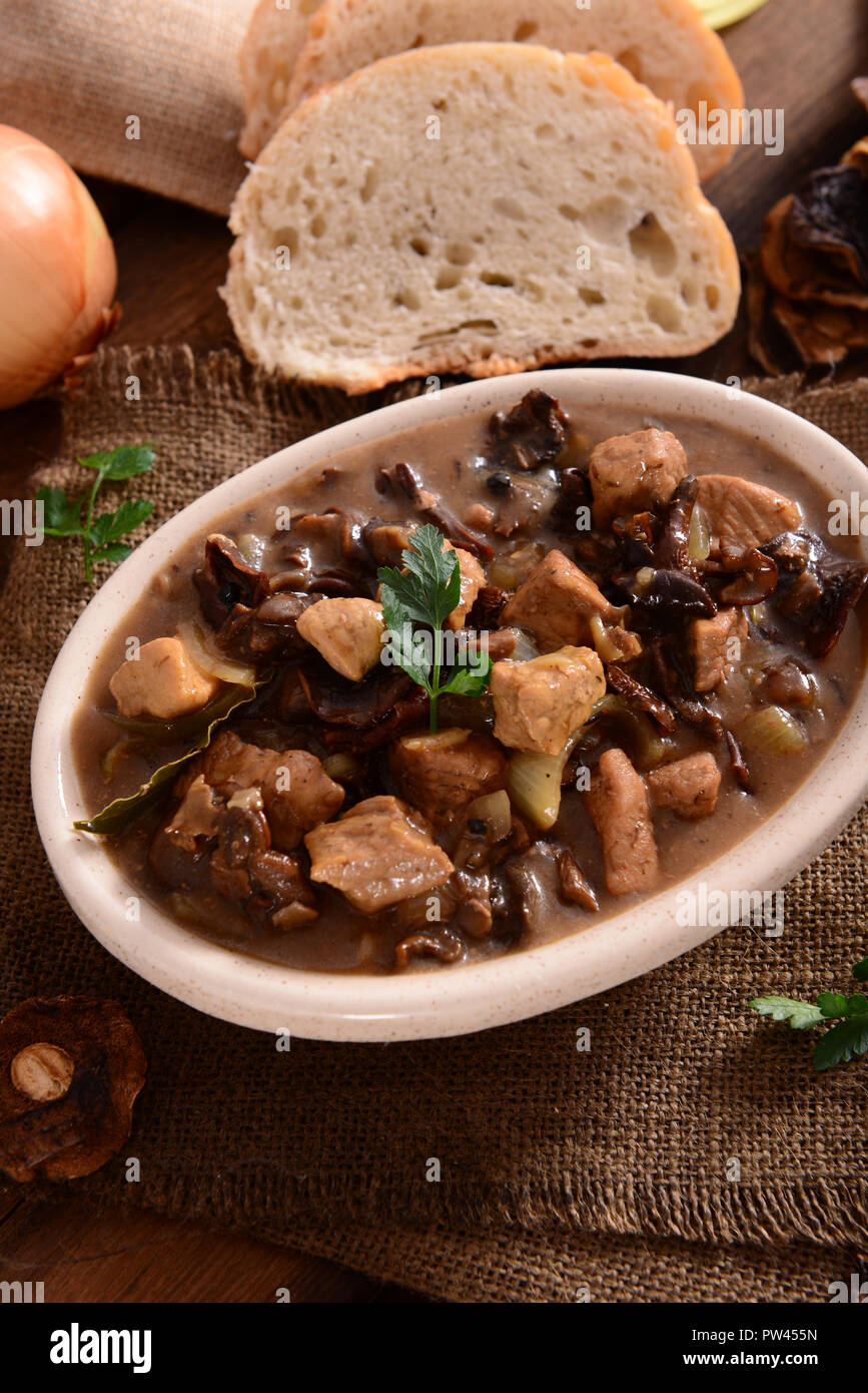 Stew with meat, mushrooms and vegetables Stock Photo Alamy