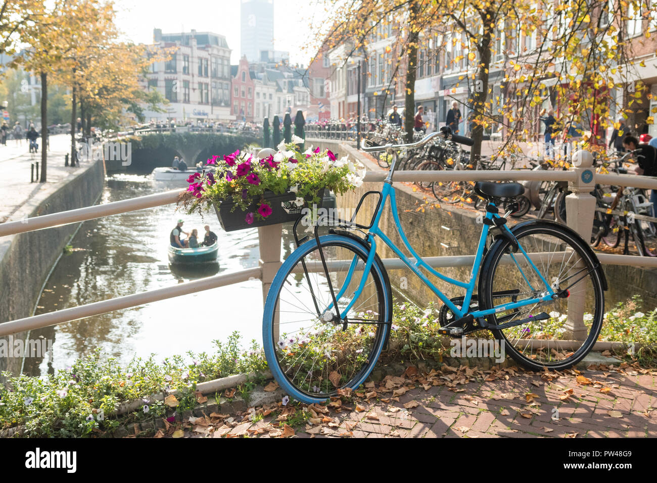 Leeuwarden, Friesland, Netherlands - dutch bicycle on a bridge over a canal Stock Photo