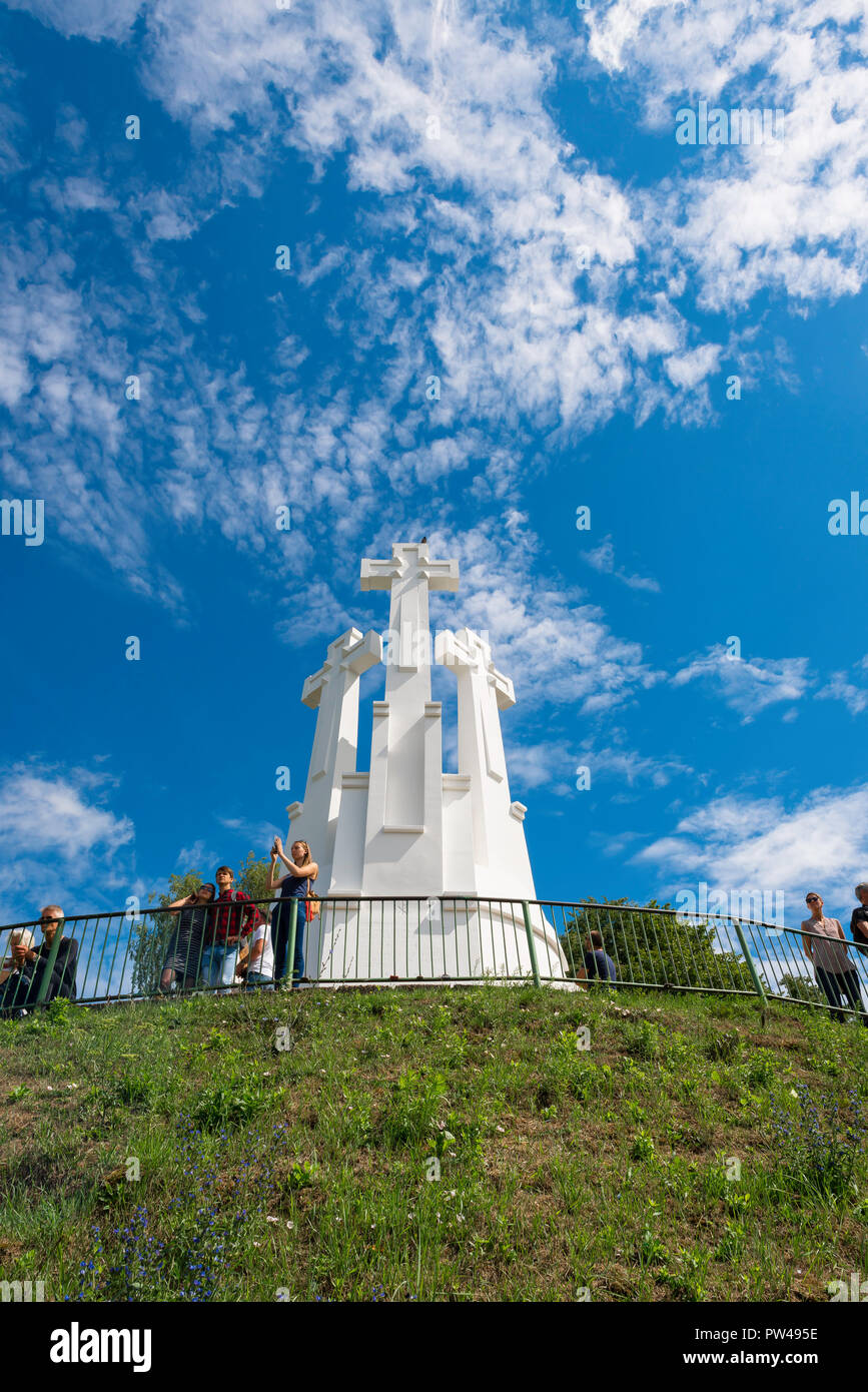 Vilnius Lithuania, view of tourists standing on the viewing terrace on Three Crosses Hill and looking down on the city of Vilnius below, Lithuania. Stock Photo