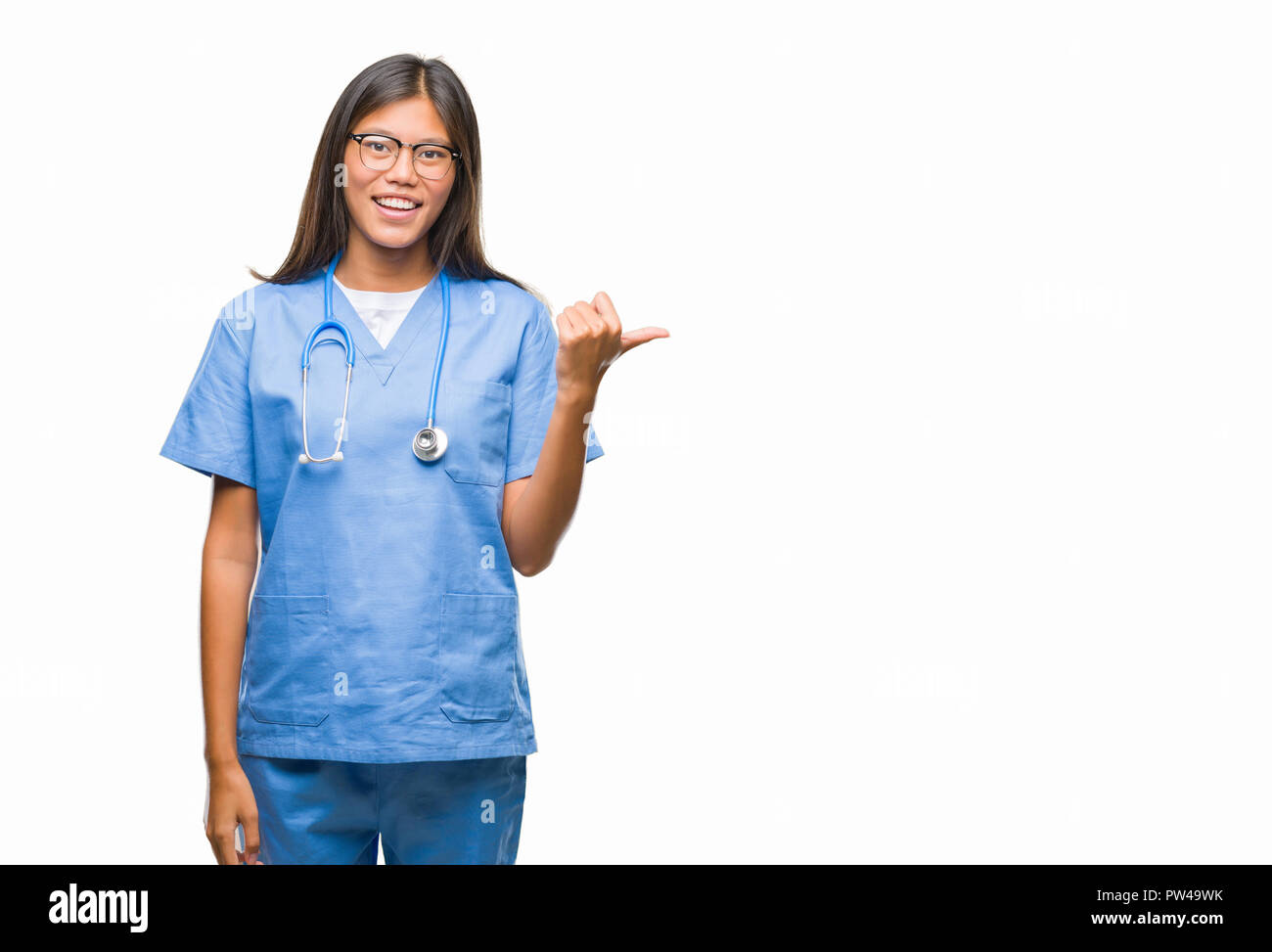 Young asian doctor woman over isolated background smiling with happy ...