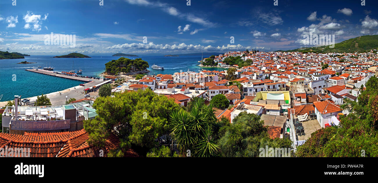 Panorama (7 vertical photos stitched) of Skiathos town from the clock tower of Agios Nikolaos church. Skiathos island, Northern Sporades, Greece. Stock Photo