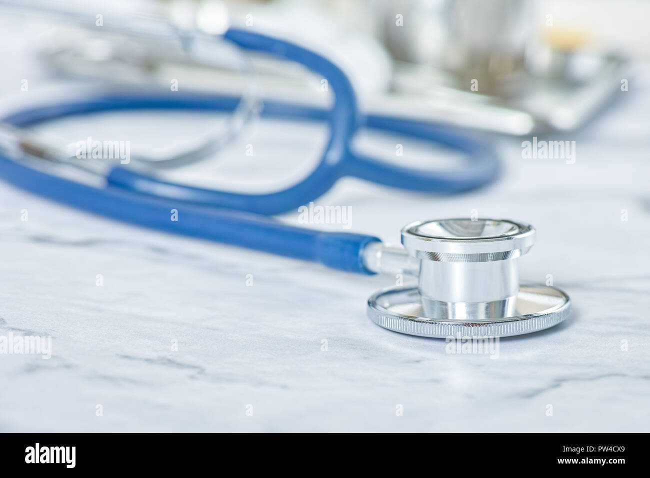 Stethoscope on doctor work park table close up for healthcare diagnosis concept background Stock Photo
