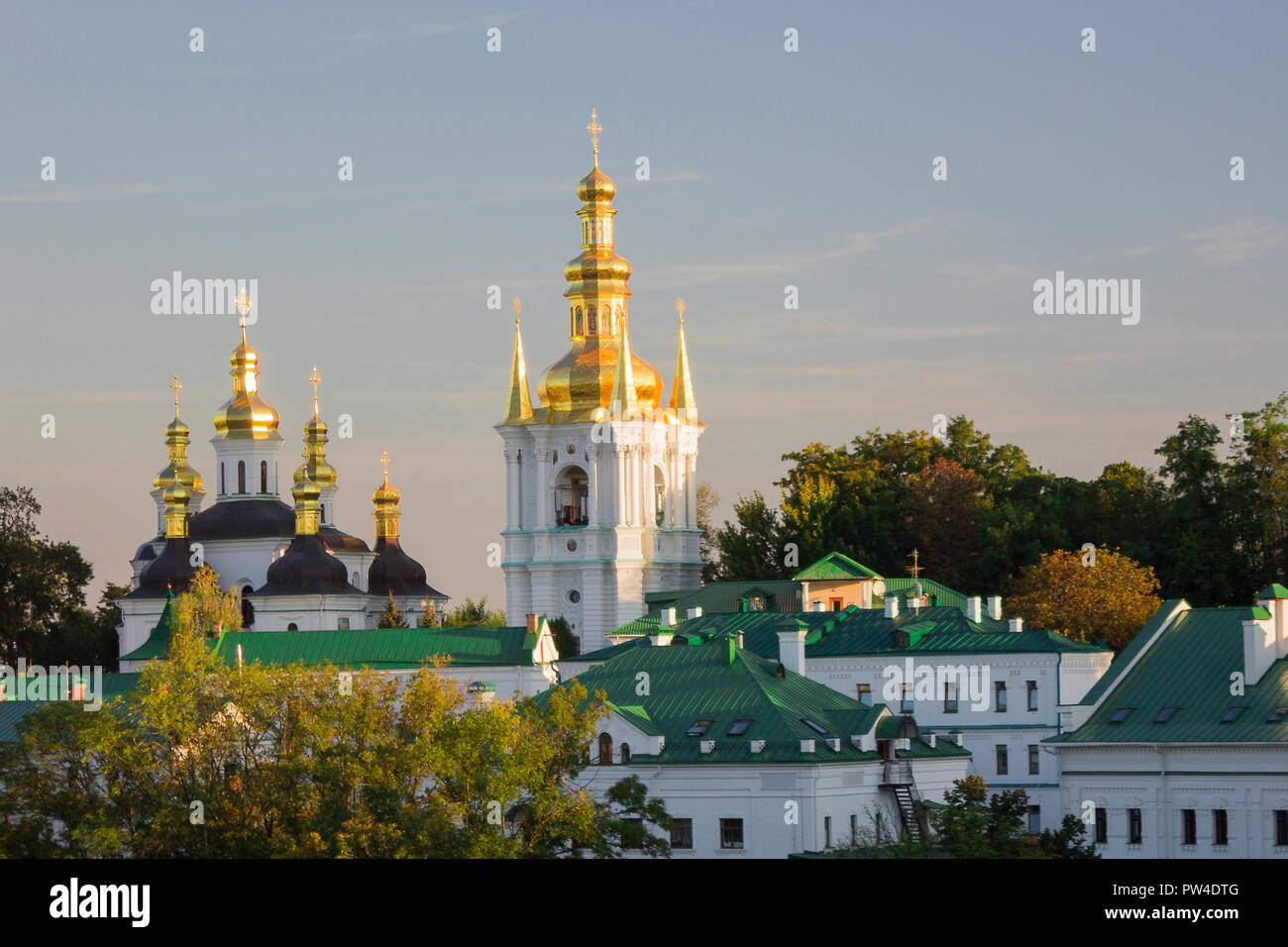 Golden-Domed Bell Tower in Pechersk Lavra on sunny day. Ground side panoramic view. Kiev, Ukraine. Famous historical place in Kyiv city center. Touris Stock Photo