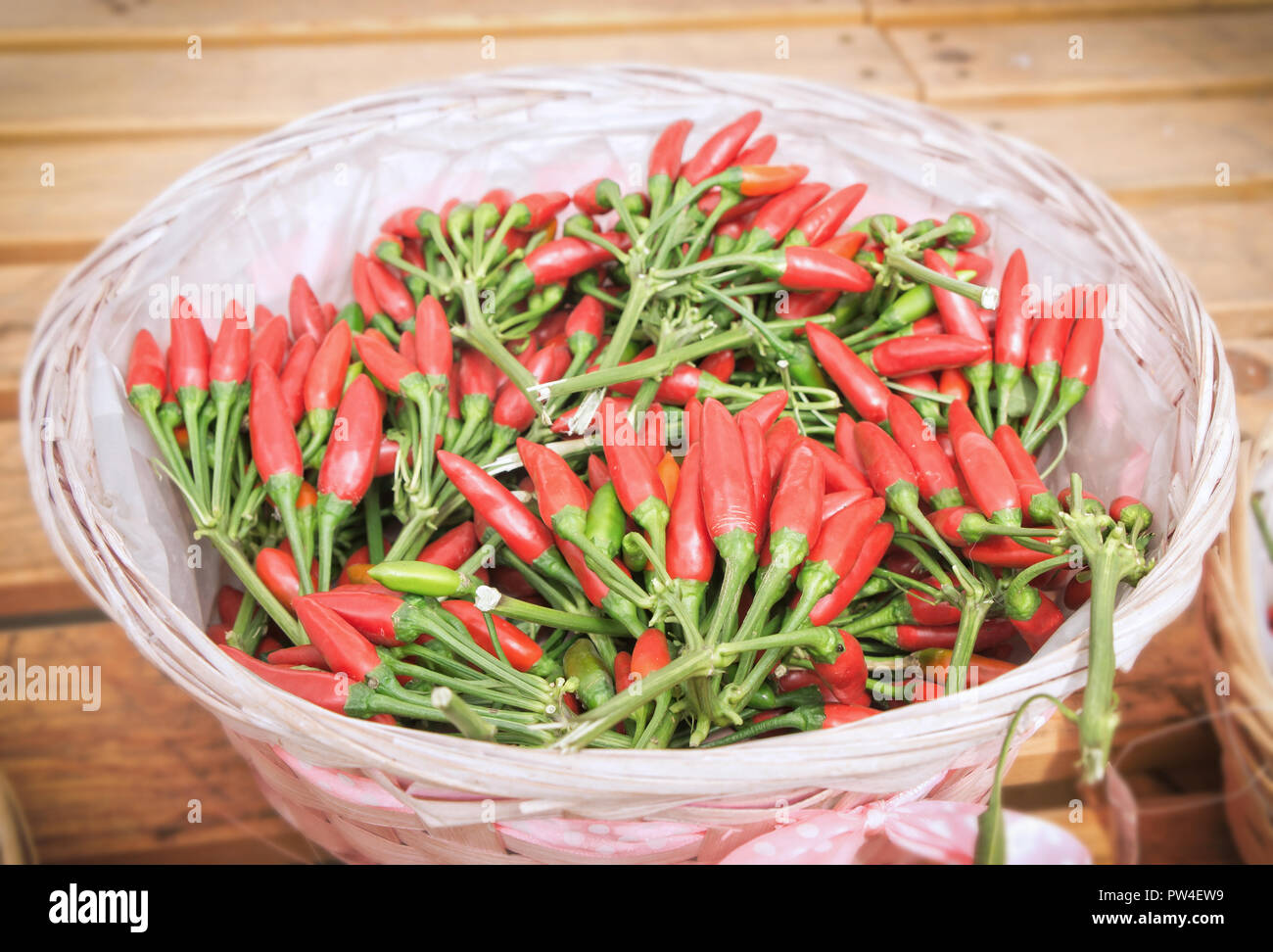 Many fresh red chilli peppers on the market hi-res stock photography ...