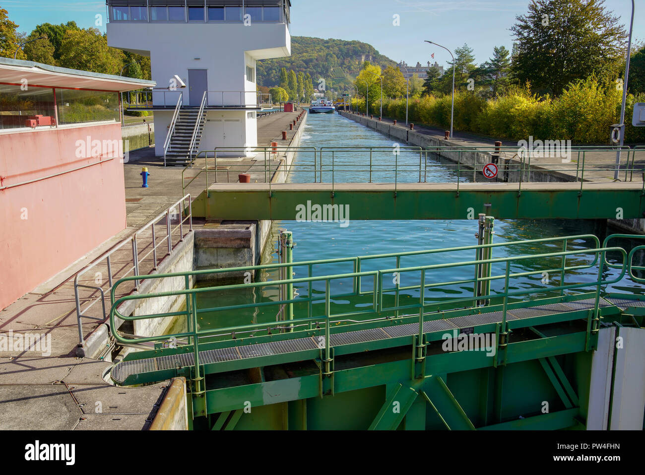 Boating through locks on Rhine river in Basel, Switzerland. Stock Photo