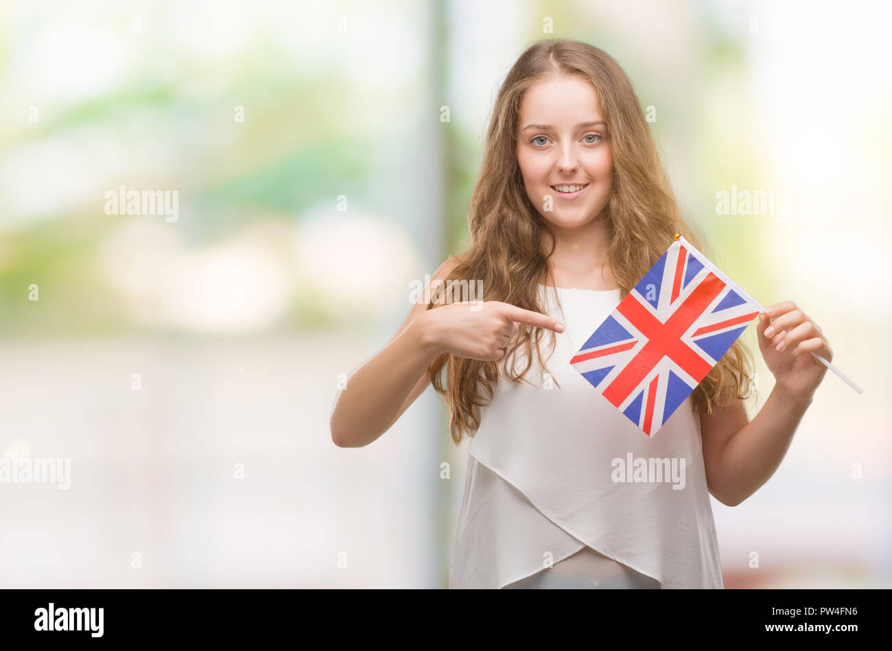 Young girl holding uk flag hi-res stock photography and images