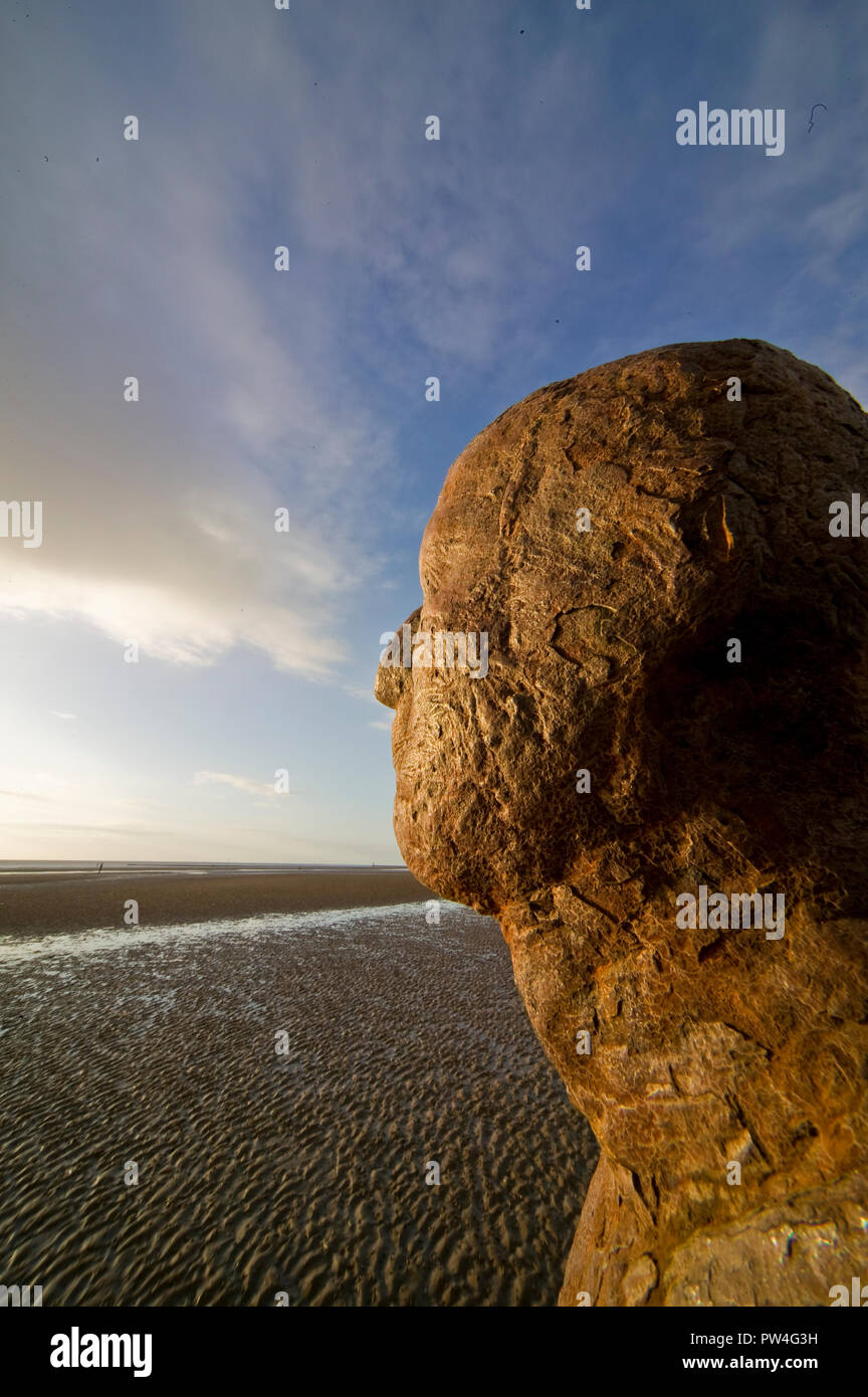 'Another Place' by Antony Gormley Iron Man statues on Crosby Beach Liverpool Merseyside Stock Photo