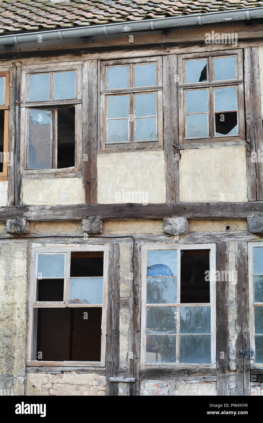 dilapidated half-timbered house in the old town of Quedlinburg Stock Photo