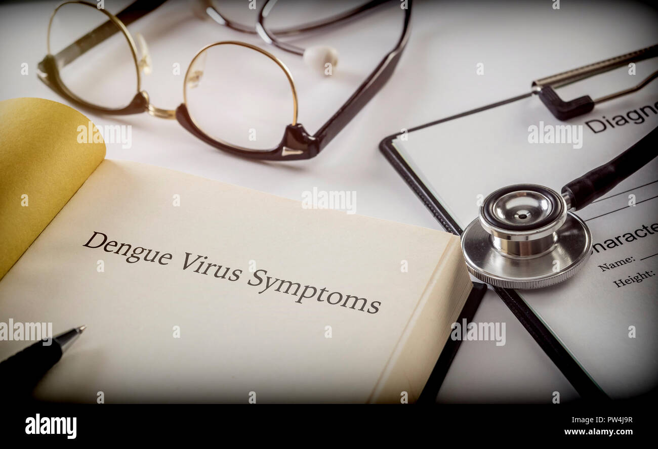 Dengue virus symptoms, book together to form of diagnosis, conceptual image Stock Photo