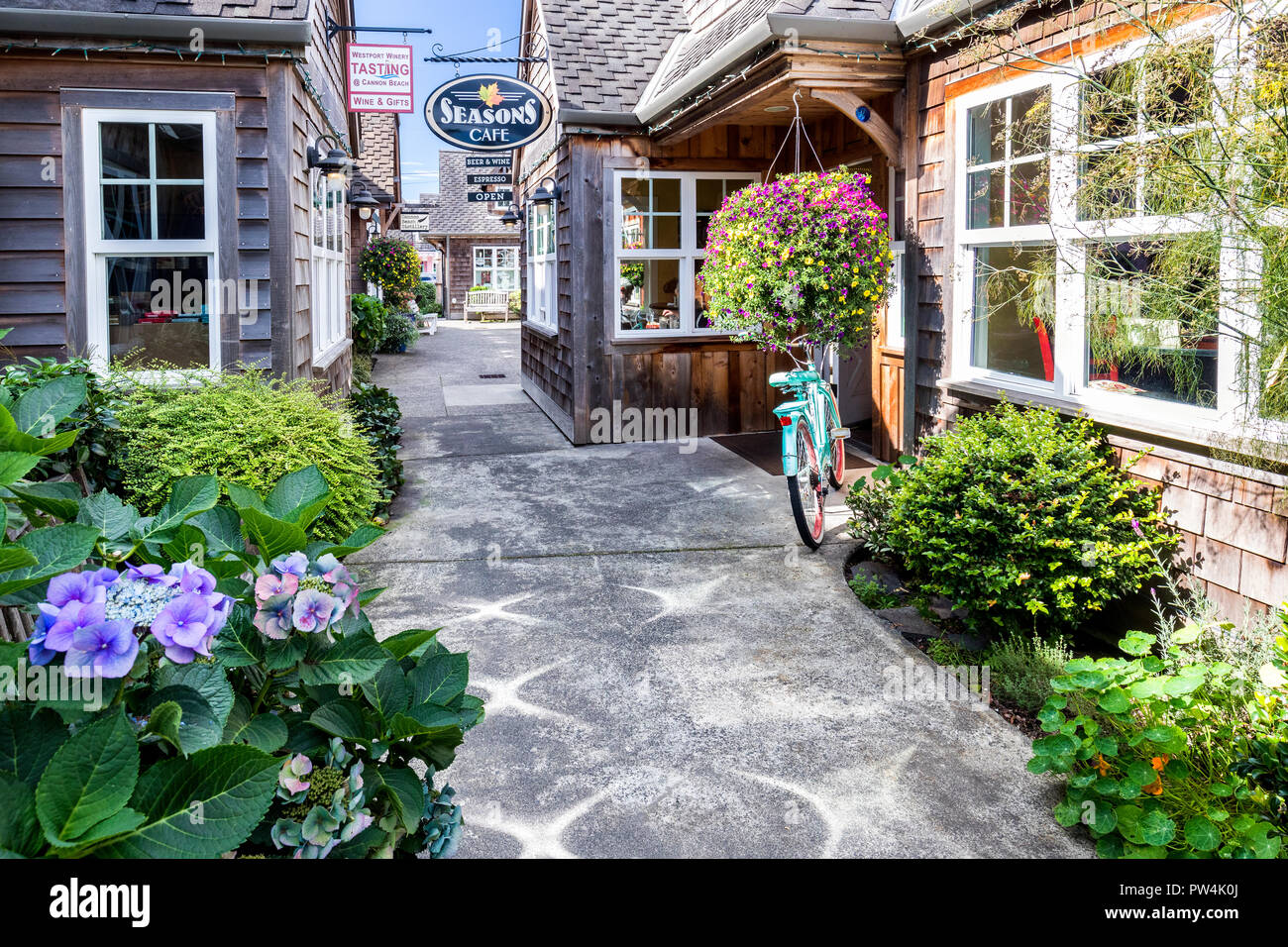 The well known Season's Cafe and other shops in quaint  Cannon Beach, Oregon, USA. Stock Photo