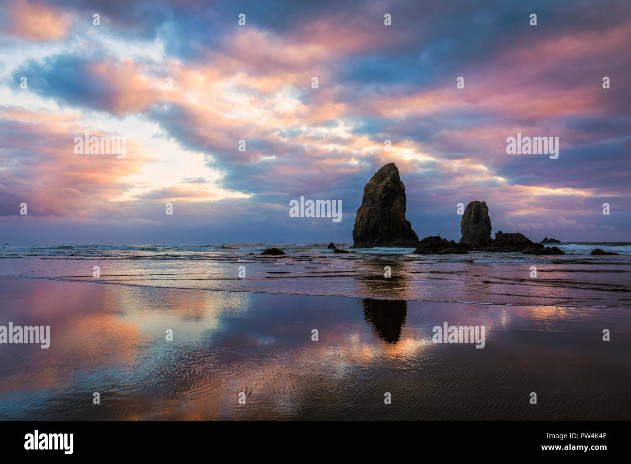 Afterglow on the Haystack Needles near Cannon Beach, Oregon, USA. Stock Photo