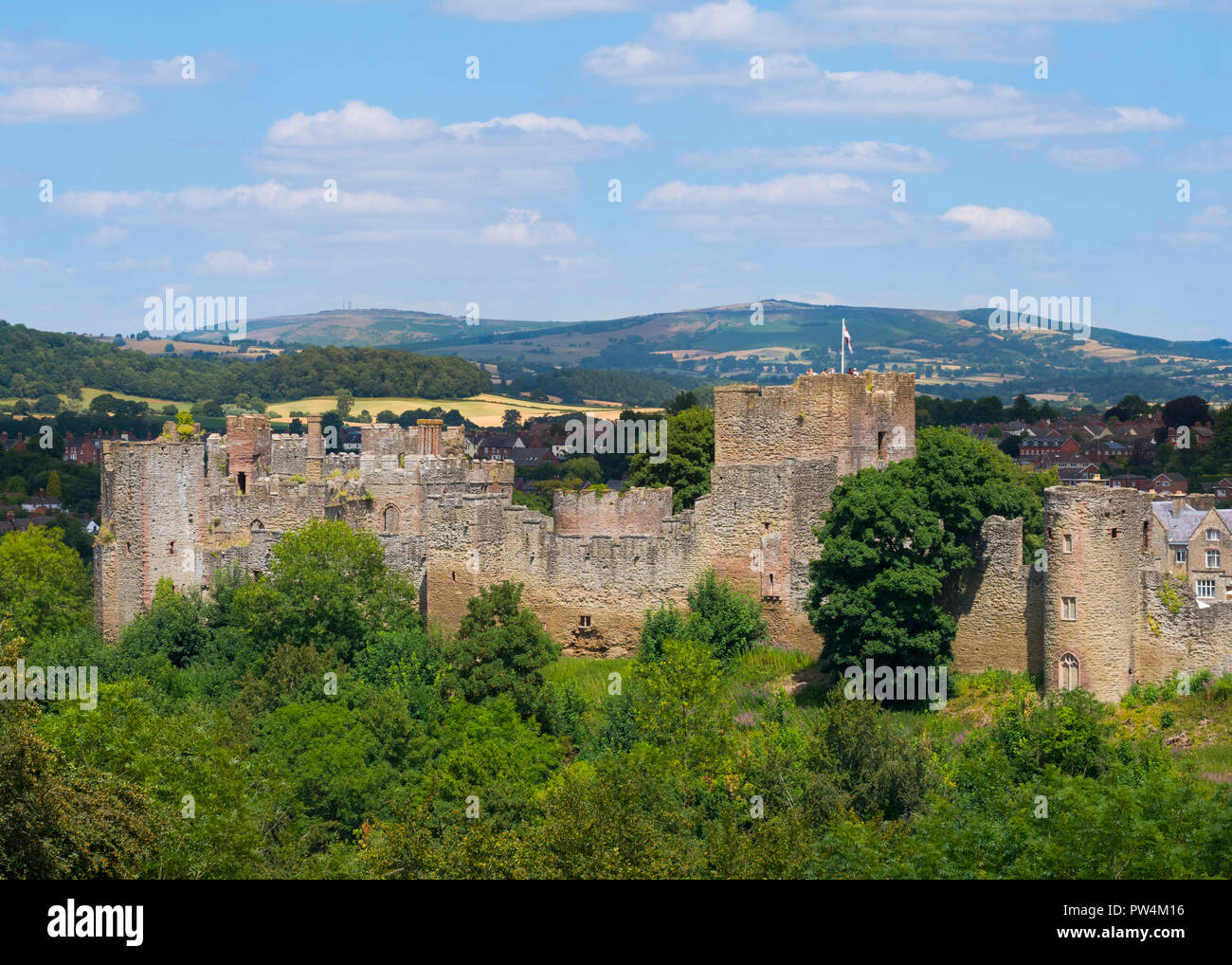 Ludlow Castle and Brown Clee seen from Whitcliffe Common, Shropshire. Stock Photo