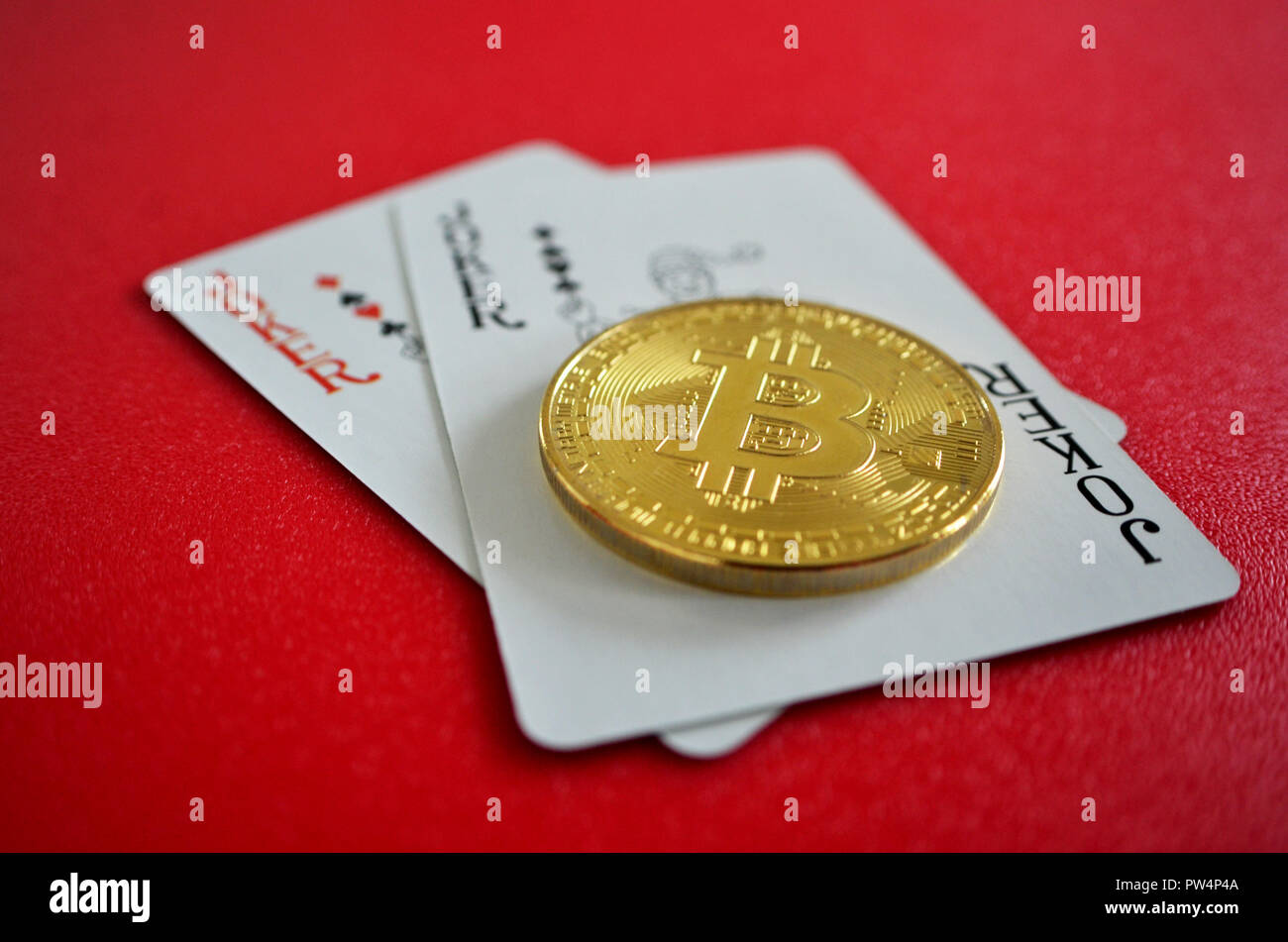 Bitcoin with joker playing cards Stock Photo