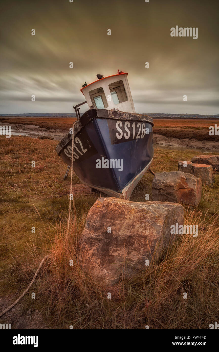 Estuary fishing boat Stock Photo