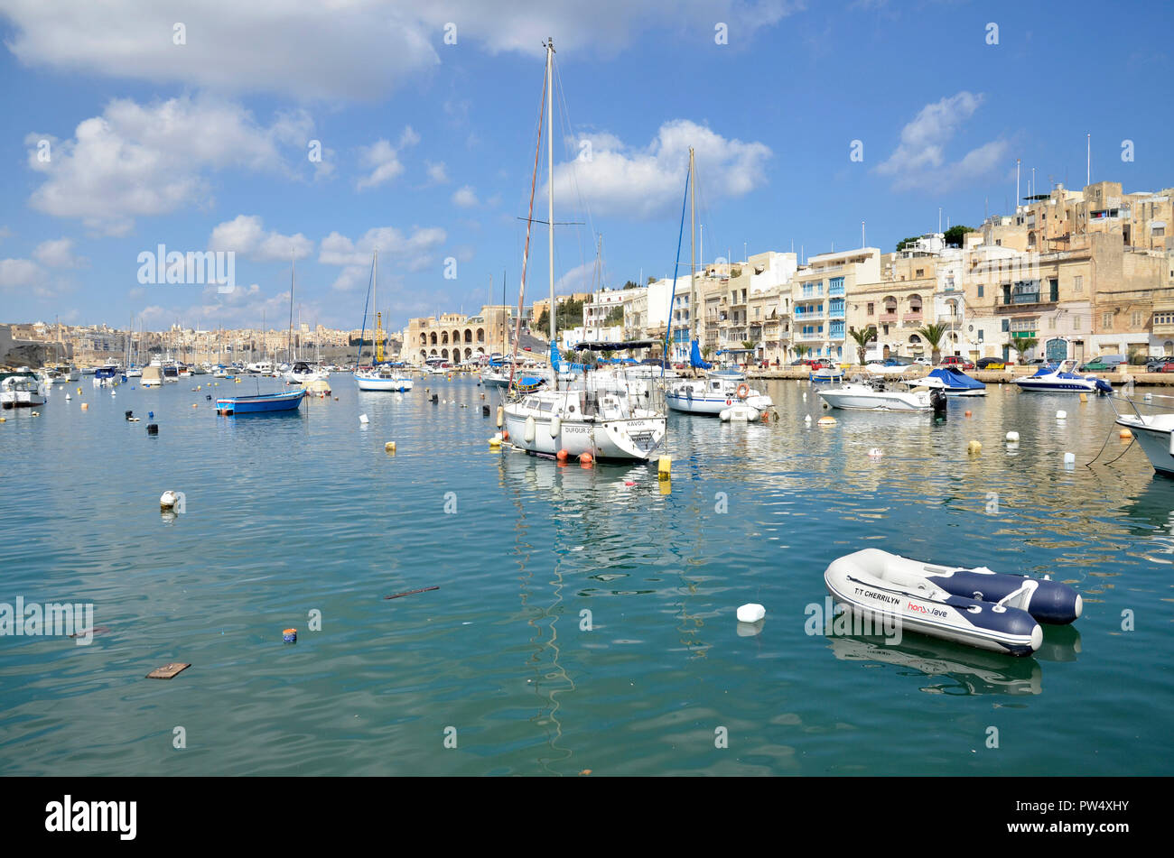 Boats in the Kalkara CReek area of the Grand harbour in the Maltese Three Cities area Stock Photo