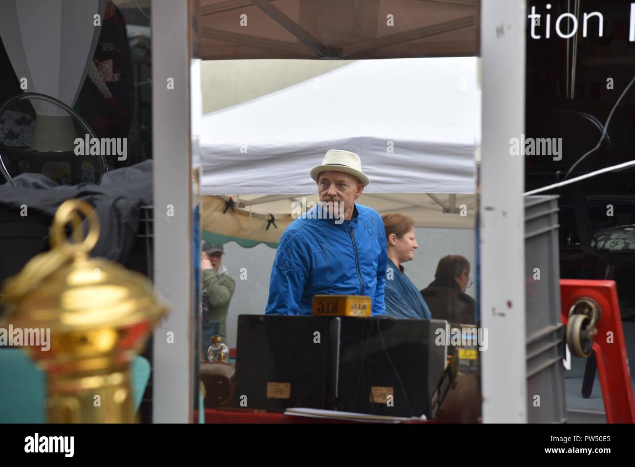Amiens réderie, or flea market a candid reflection in a mirror of man
