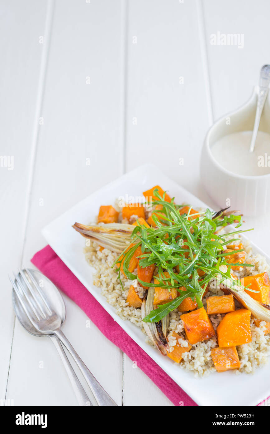 Smoked freekeh, roast squash and sweet potato salad with yoghurt and