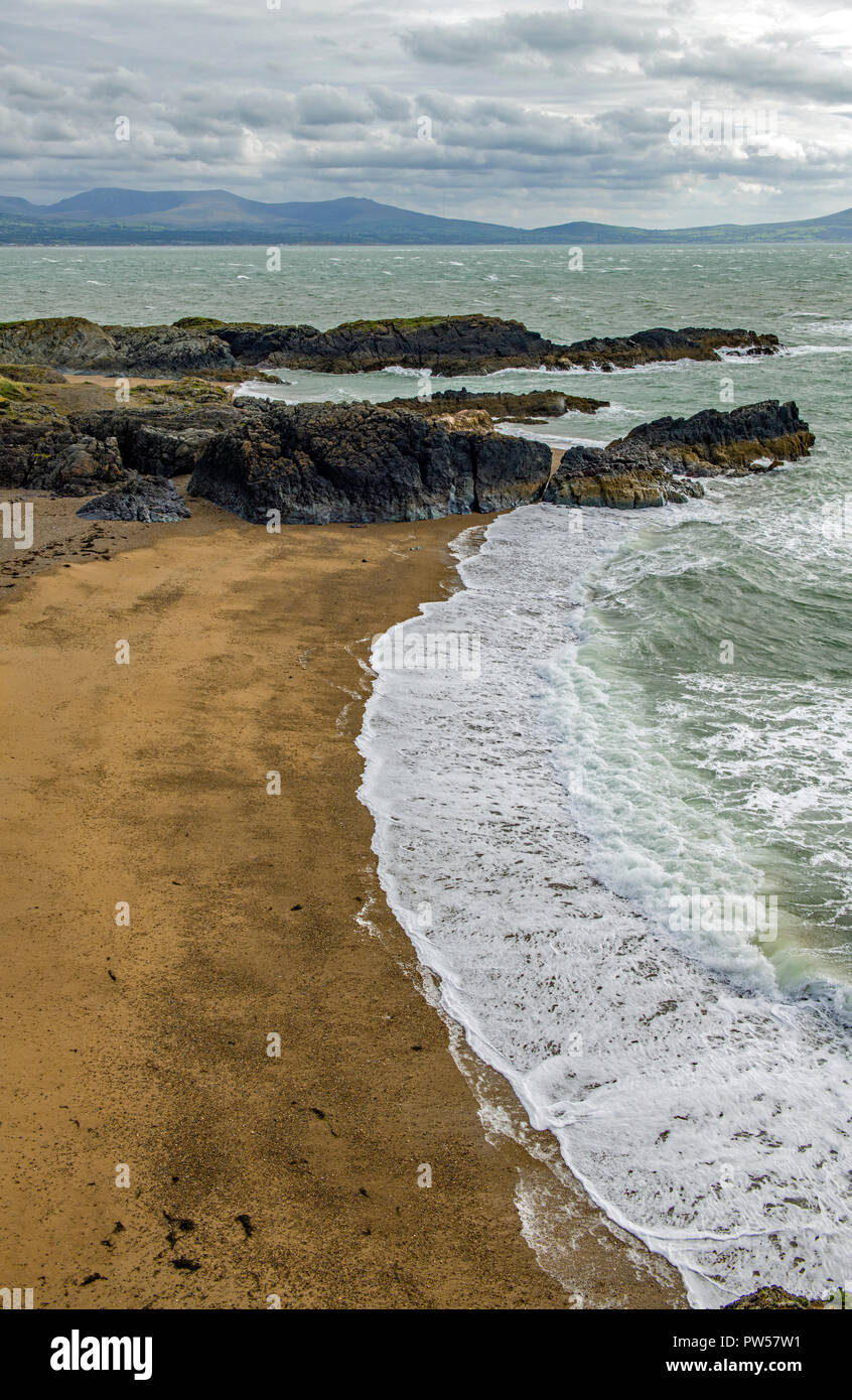 Beach at the tip of Llanddwyn Island Angesey North Wales Stock Photo