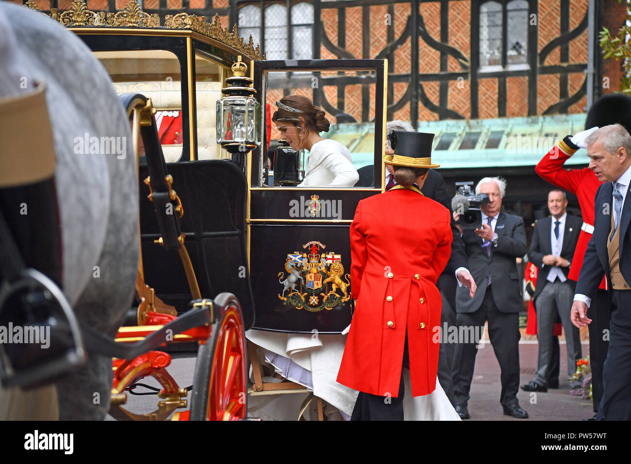 Princess Eugenie and her husband Jack Brooksbank travel in the Scottish State Coach during their carriage procession, following their wedding at St George's Chapel, Windsor Castle. Stock Photo