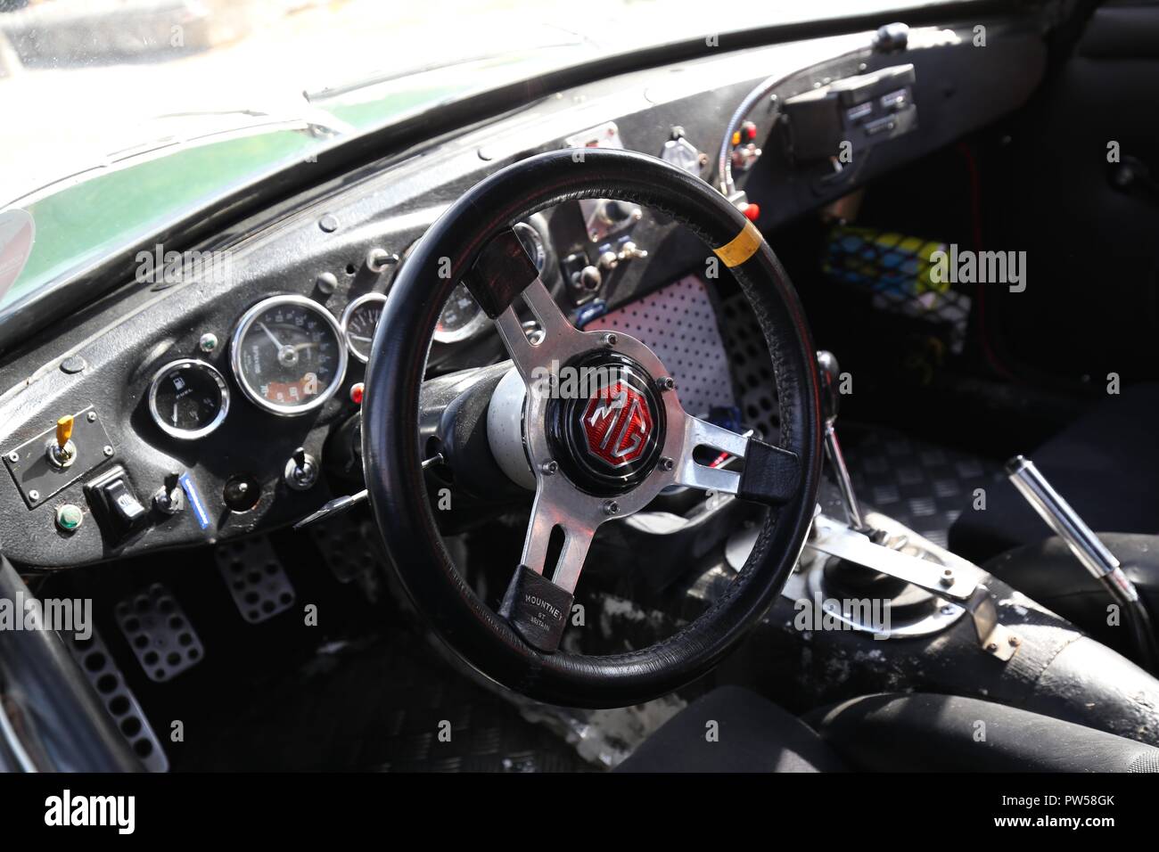 In The Cockpit of an MGB GT at Château de Neuville in Gambais (78) – France. Stock Photo