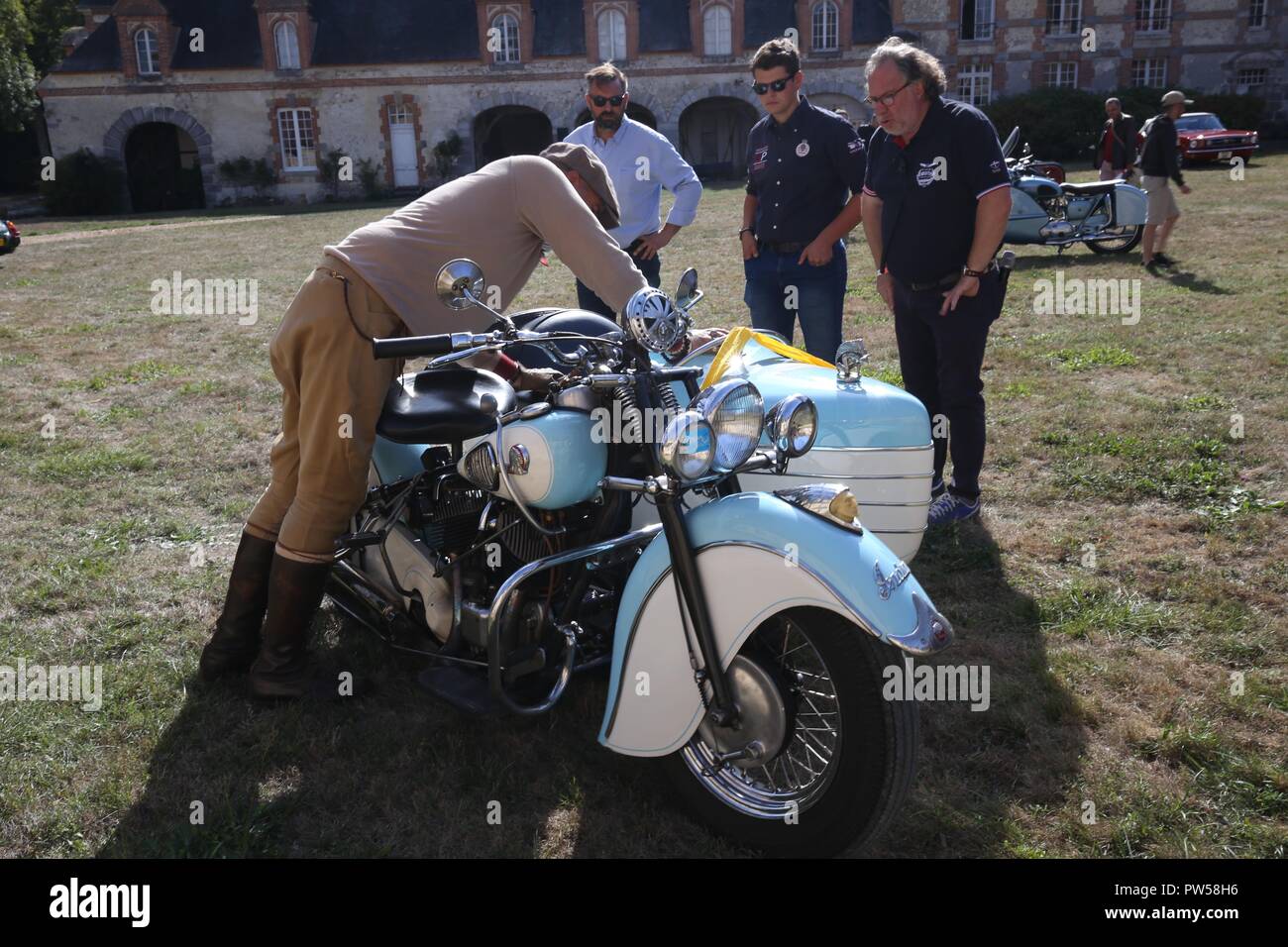 An Indian Sidecar outfit being admired at Château de Neuville in Gambais (78) – France. Stock Photo