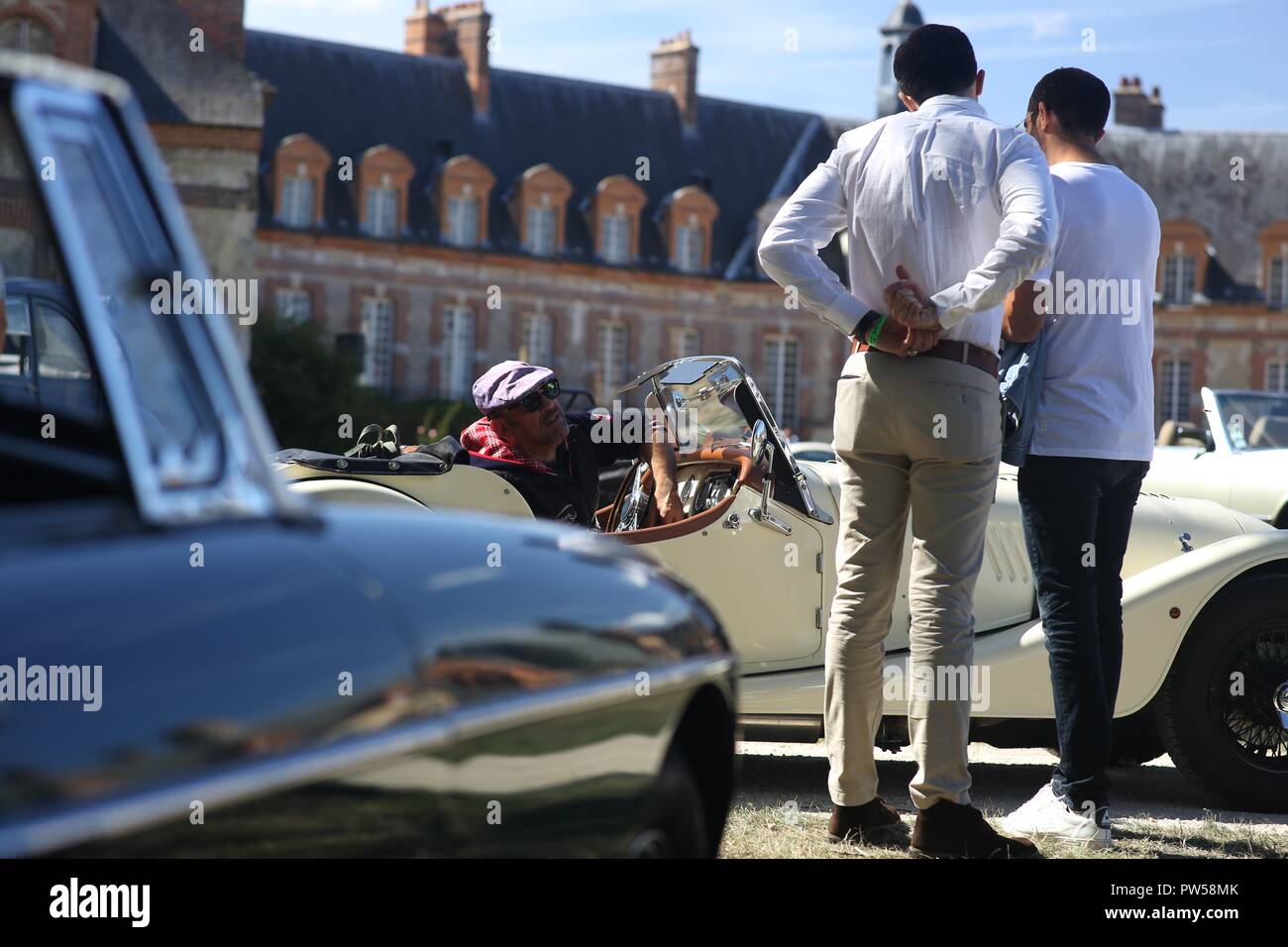 Arriving in a Morgan Plus 8 at Château de Neuville in Gambais (78) – France. Stock Photo