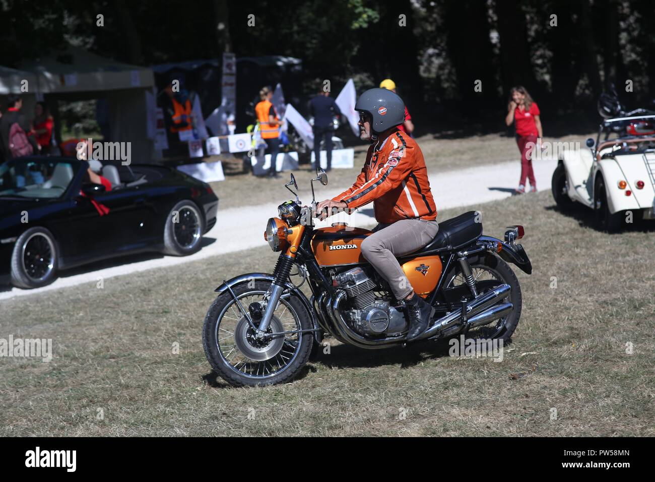 Arriving on a Honda CB750 Four at Château de Neuville in Gambais (78) – France. Stock Photo