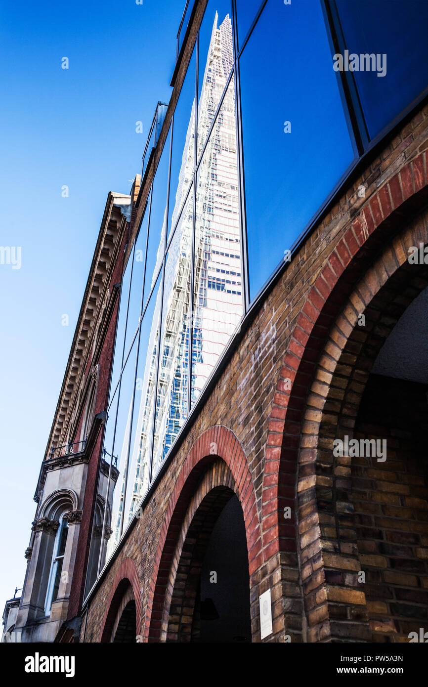 The Shard in London reflected in another building. Stock Photo