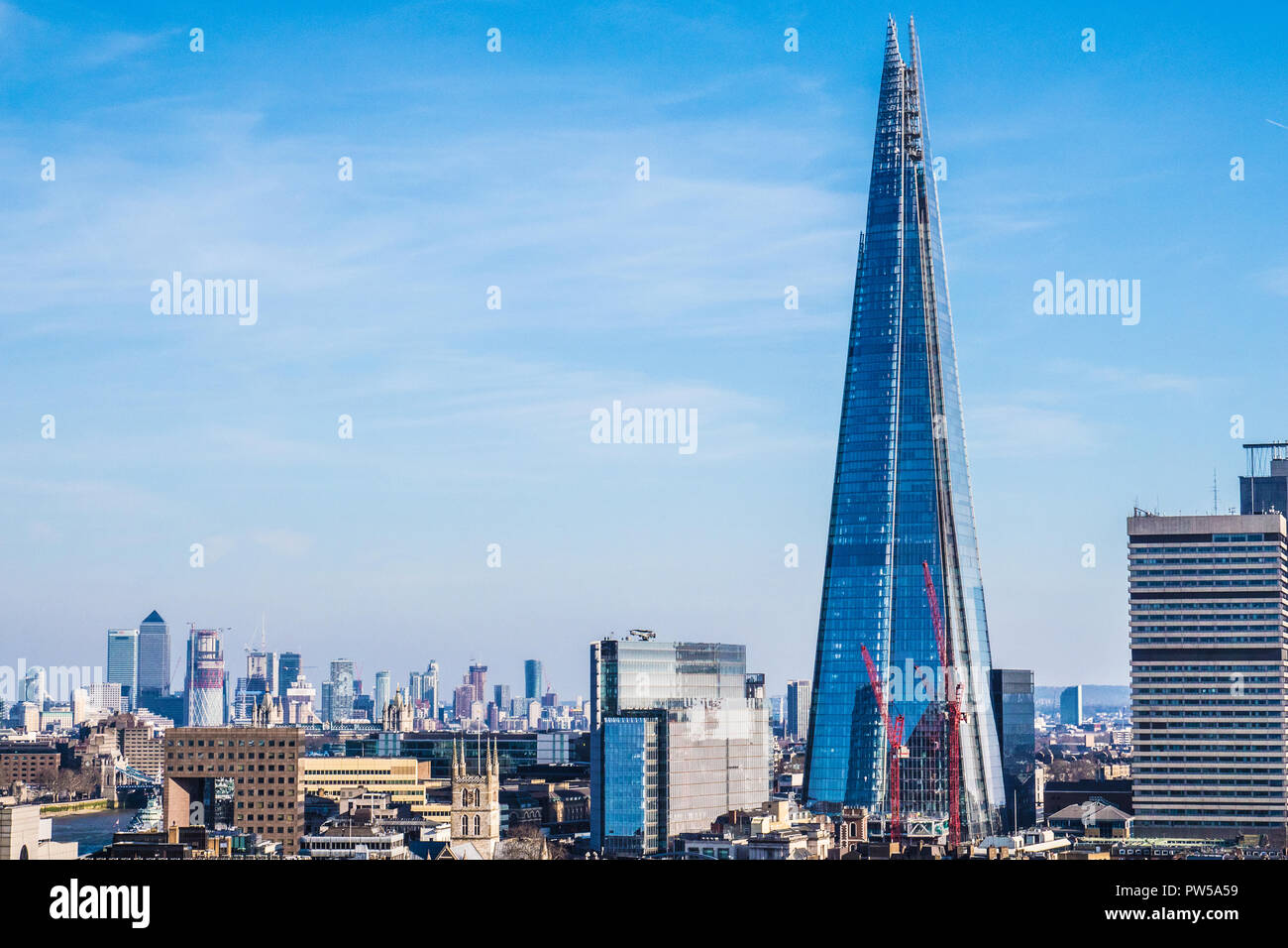 The London skyline with the iconic Shard building seen from the Tate Modern. Stock Photo