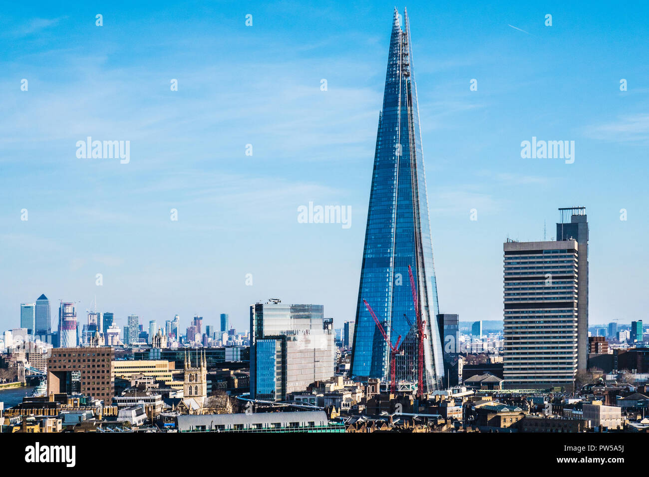 The London skyline with the iconic Shard building seen from the Tate Modern. Stock Photo