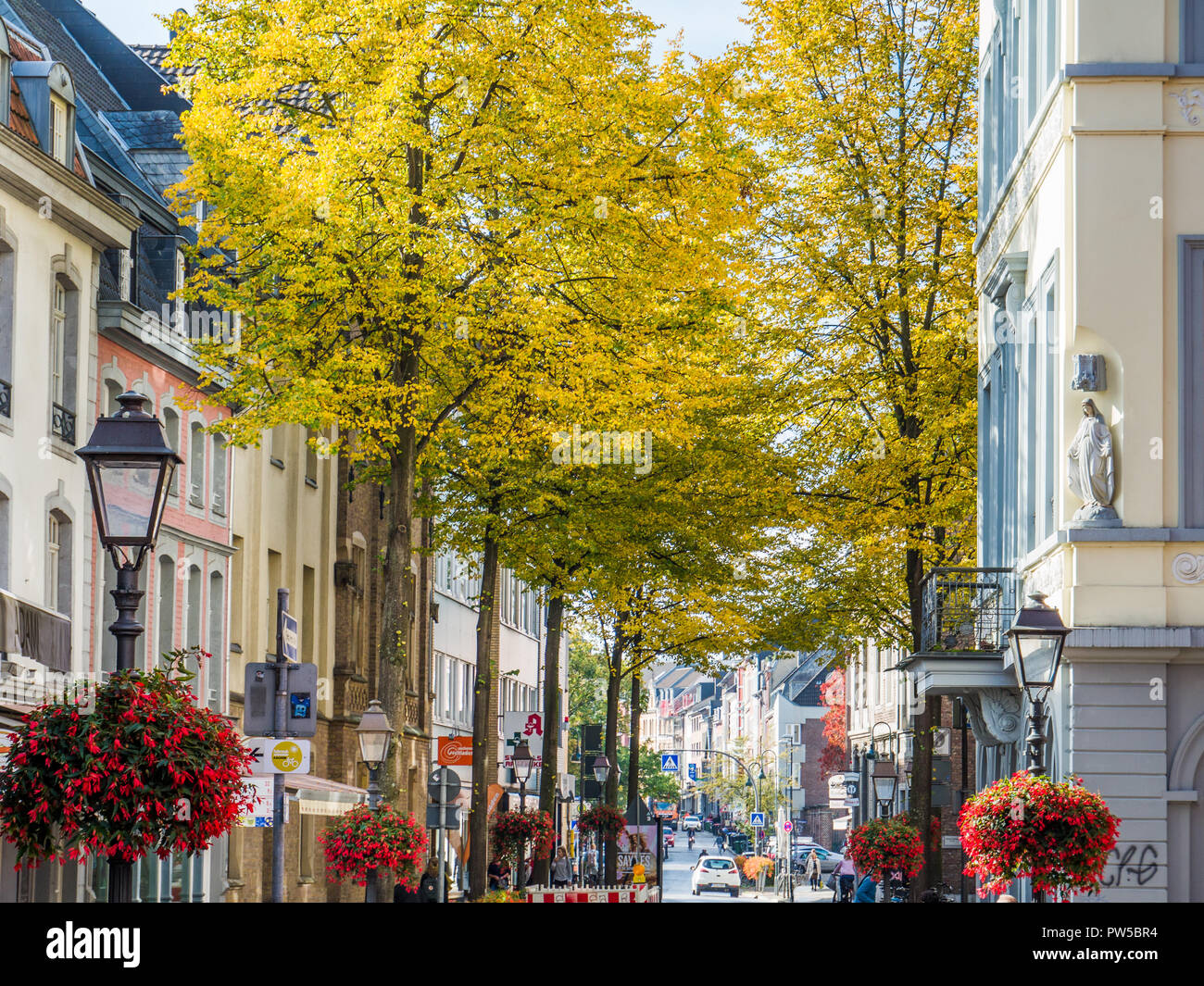 Historical commercial street during autumn in Aachen, Germany Stock